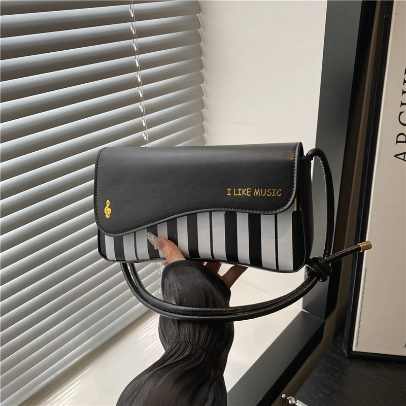 New cross-border product: Fashionable and stylish piano key, stylish hand-held small square bag, versatile color contrast, high-end feel, crossbody women's bag full figure