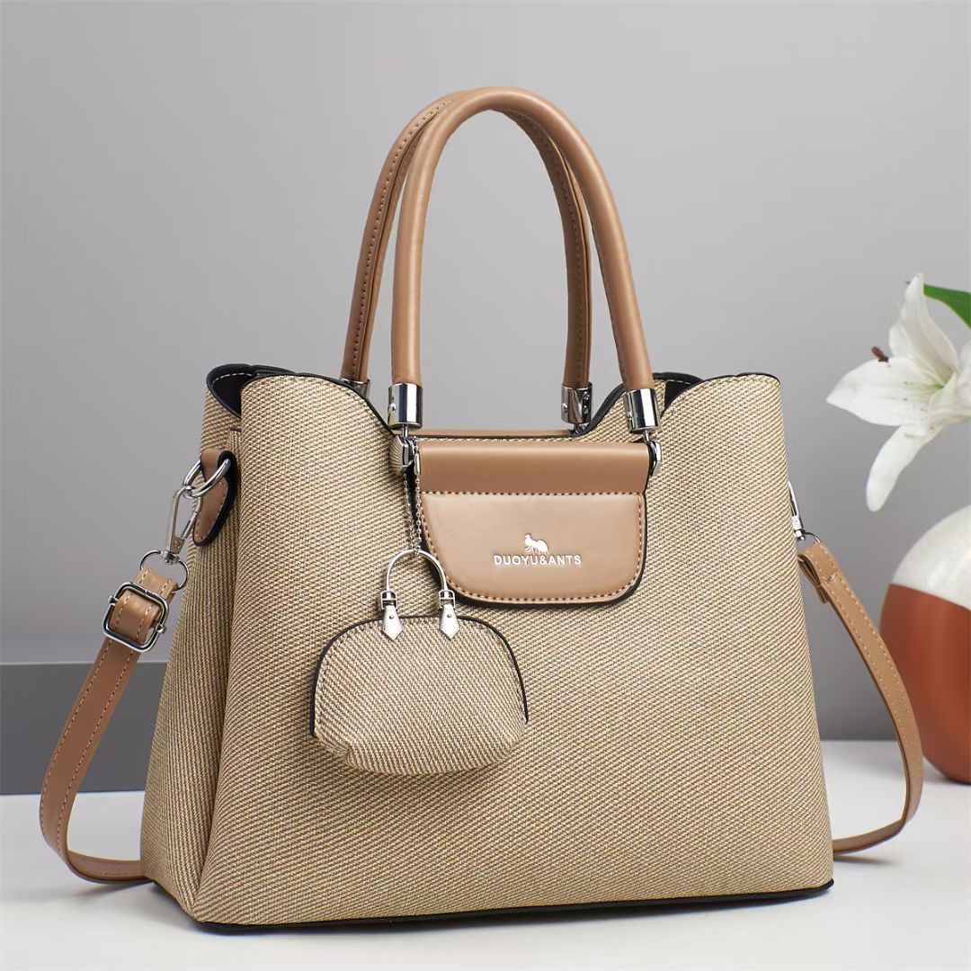 The new trend of mother and child handbags lies in the high-quality single-shoulder bags, fashionable and versatile Korean-style niche design crossbody bags for export details Picture