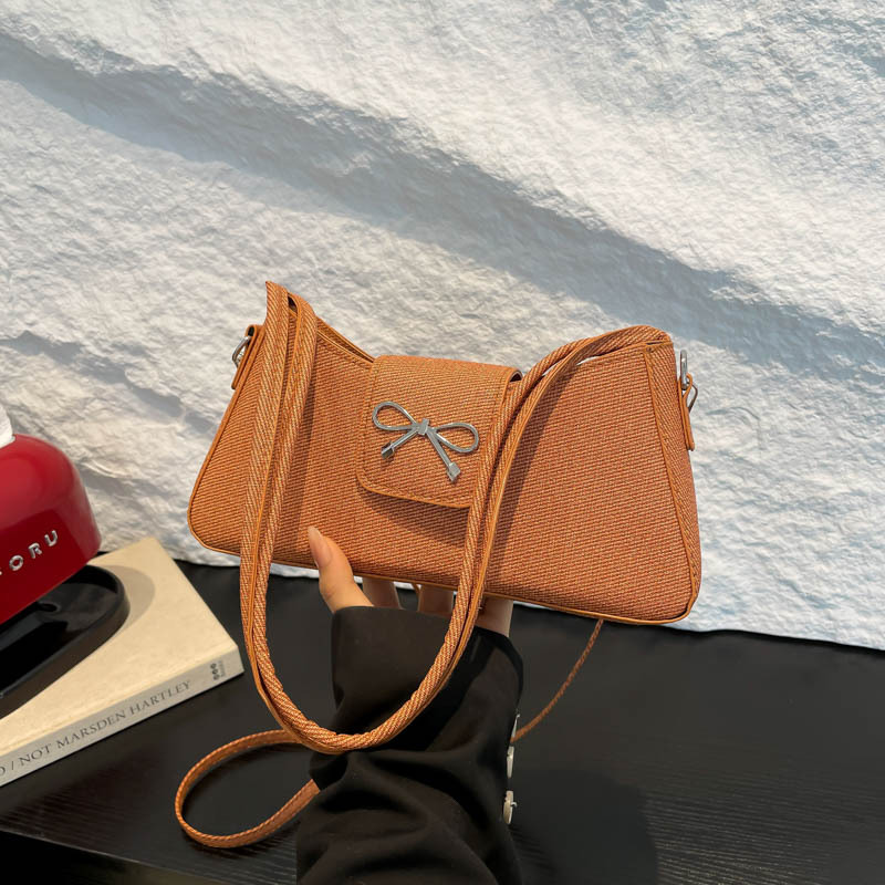 2025 New Korean-style, niche, high-end, versatile commuter baguette bag, minimalist bow, single-shoulder, underarm bag for women full figure