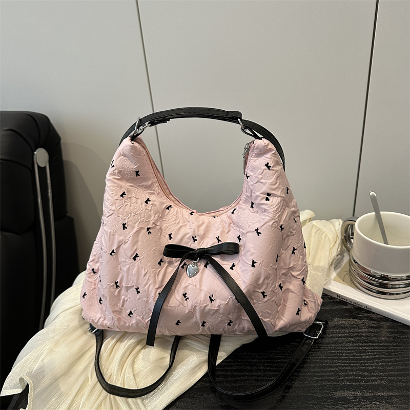 Cross-border trend bow underarm tote bag 2025 New style simple commuting multi-functional backpack full figure