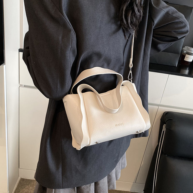 Hand-held fashionable bucket bag for women 2025 new style simple and versatile single-shoulder bag, Korean style niche high-end casual women's bag full figure