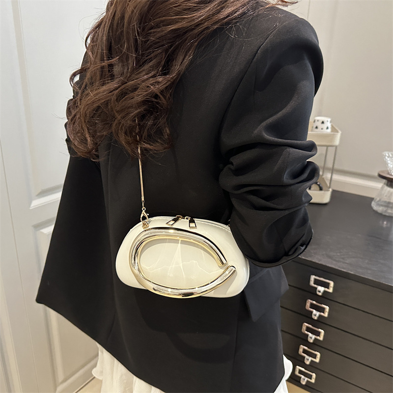2025 New style personalized round box hand-held dinner bag, small bag, retro hardware metal handle chain crossbody bag details Picture