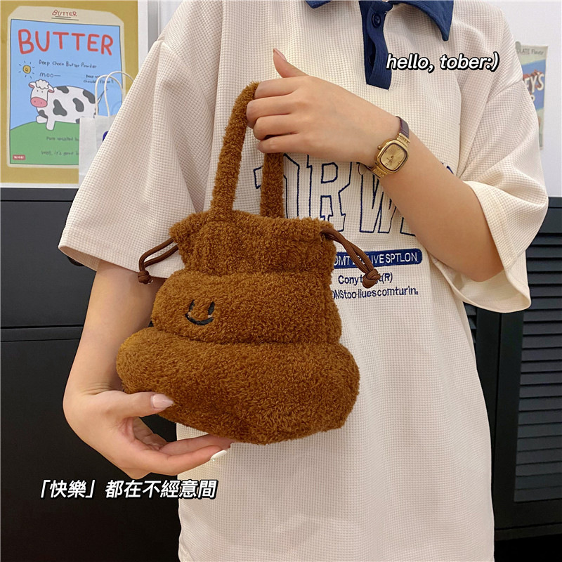 New cartoon creative poop hand-held crossbody bag for girls, cute and funny, niche drawstring single-shoulder bag factory direct sales Application Scenario