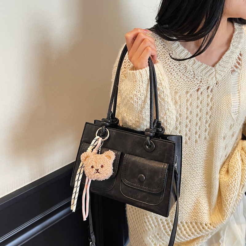 The 2025 new summer Korean-style handbag features a niche design for women, including tote bags, multi-pocket single-shoulder bags, and fashionable crossbody bags details Picture
