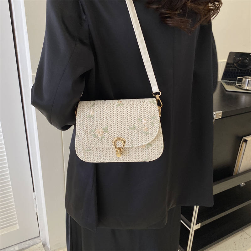 Spring and Summer straw woven bag for women 2024 New style, fresh and delicate lace flower woven saddle bag, versatile single-shoulder crossbody bag details Picture