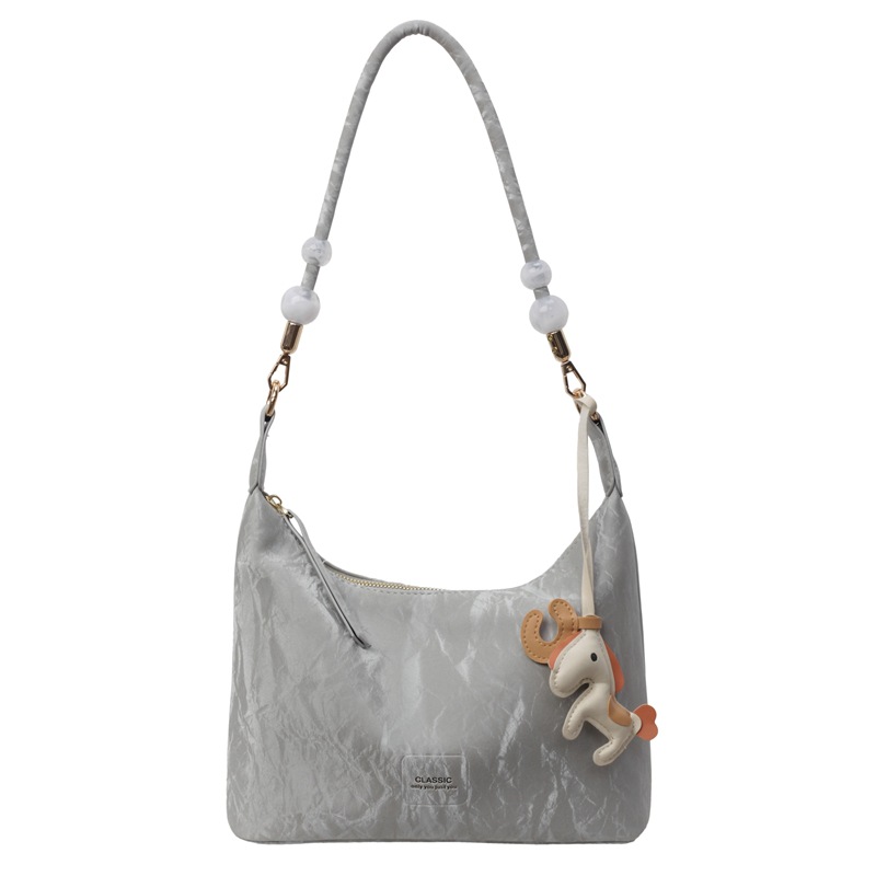 A high-end, light luxury and niche handbag for women, a new 2025 fashionable Korean version large-capacity commuting crossbody dumpling underarm bag Item Picture