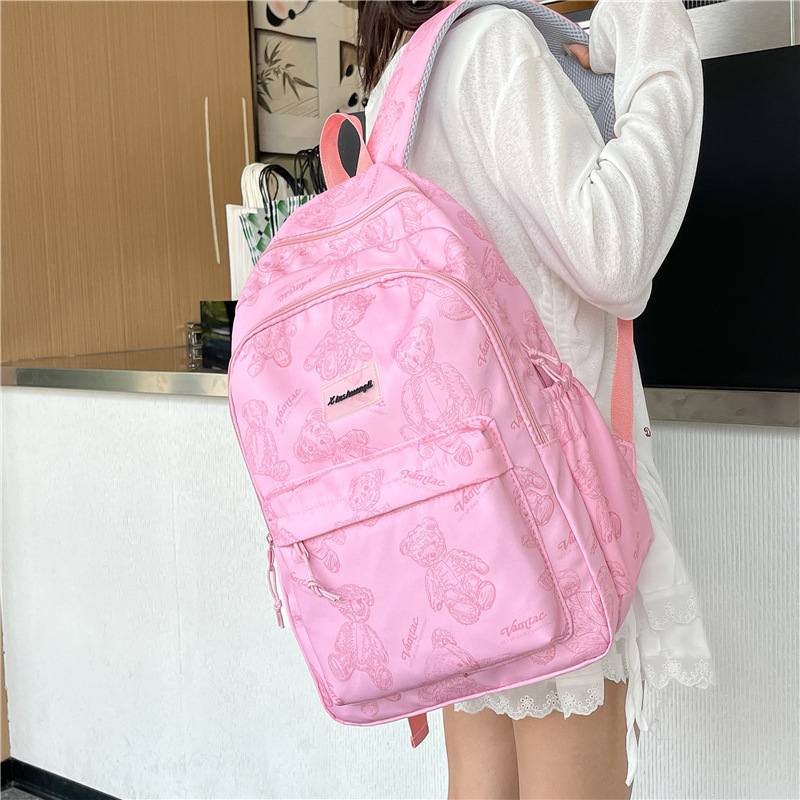A new, stylish, lightweight, large-capacity, cool and casual backpack for junior and senior high school students, and a sweet handbag details Picture