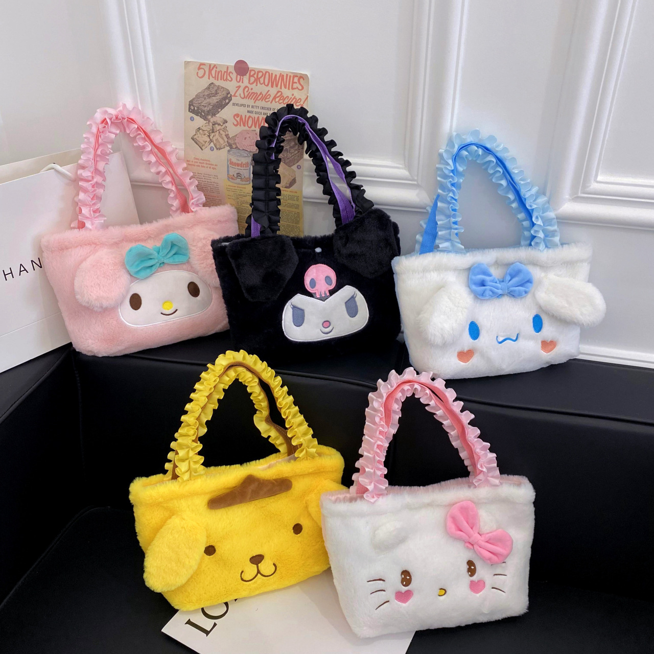 Wholesale of new ribbon plush toy bags, girls' shoulder bags, hand-held large-capacity festival gifts, makeup bags and storage bags full figure