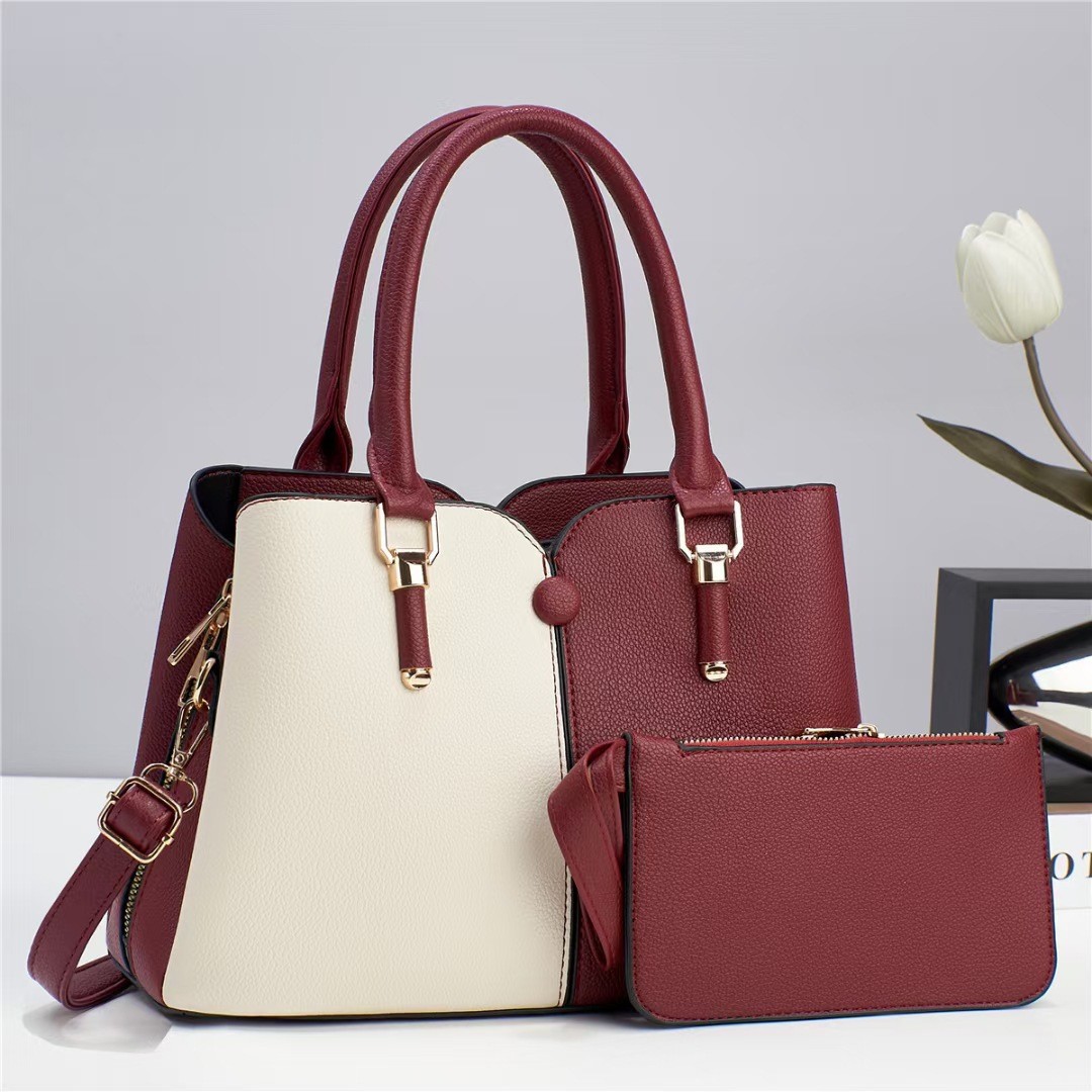 The new large-capacity, color-blocking hand-held mom bag for women in the autumn and winter of 2024 is a trendy and fashionable single-shoulder crossbody bag Specification drawing
