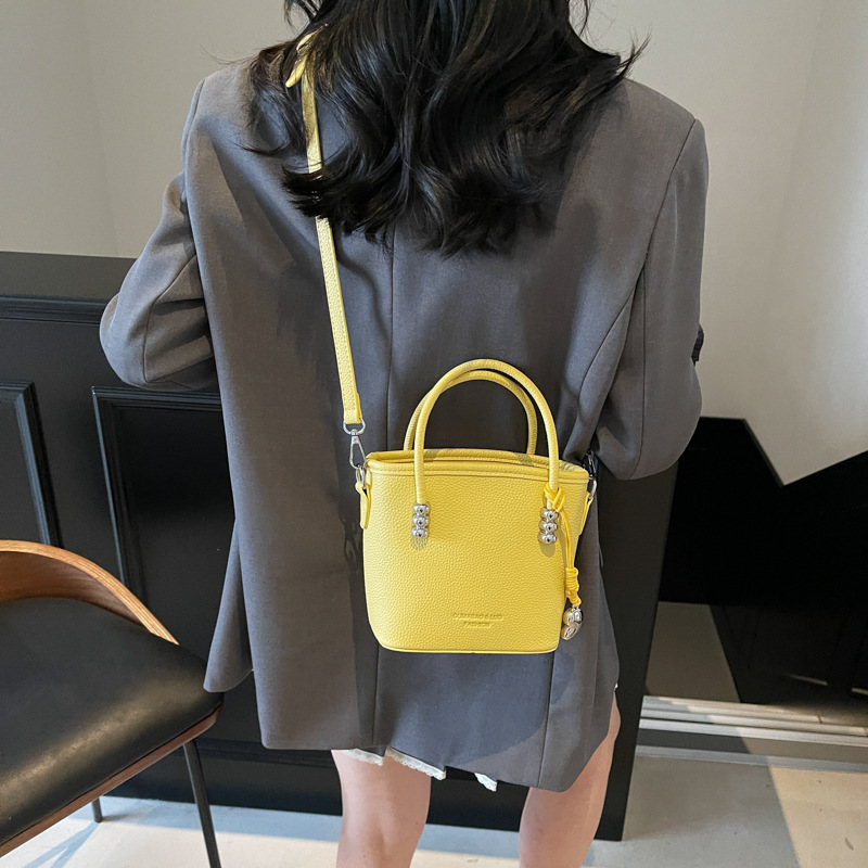 2025 New high-end solid color hand-held bucket bag, stylish and versatile single-shoulder bag for women, trendy and fashionable crossbody bag Specification drawing