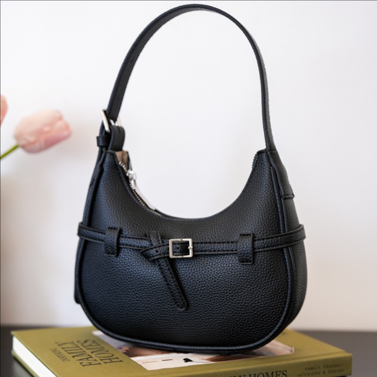 A niche design hand-held underarm bag for women in 2025, a fashionable and retro commuter bag, versatile ins single-shoulder crossbody bag full figure