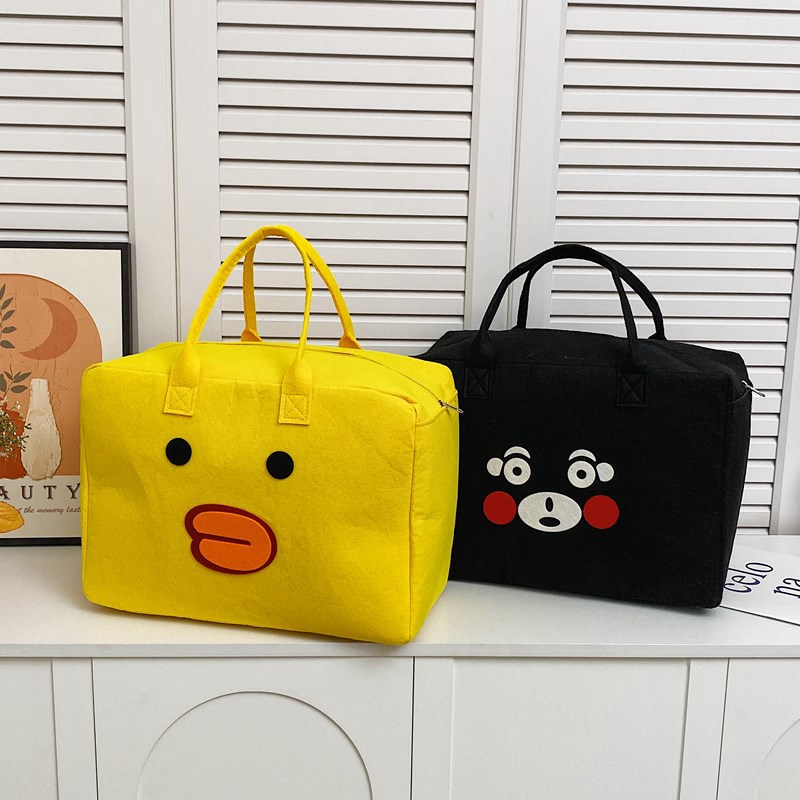 Large-capacity cartoon felt storage bag, cute cartoon children's travel luggage bag, short-distance fashionable and portable storage bag Specification drawing
