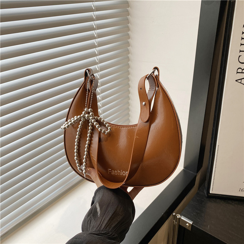 This year, niche design bags are in fashion. In 2025, there are new women's bags, summer commuting crossbody bags, and unique dumpling bags full figure