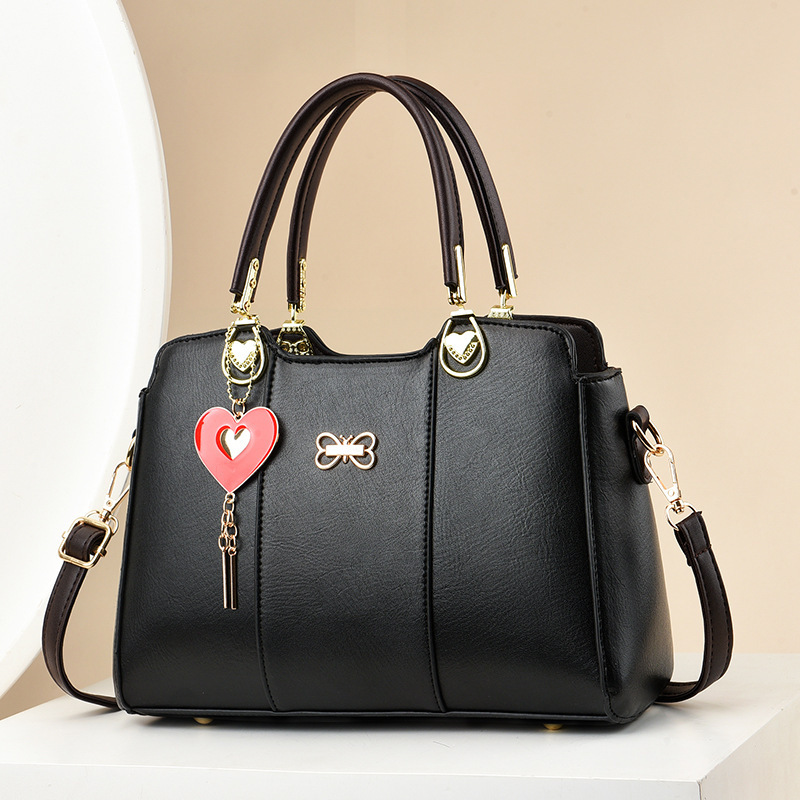 This is a new 2023 handbag for women, featuring a high-end texture, large capacity and fashionable design. It is a single-shoulder crossbody bag for middle-aged mothers full figure