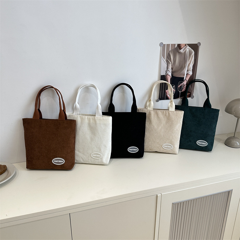 Women's corduroy 2025 new bucket bag, Korean style fashionable hand-held shoulder bag, simple and versatile crossbody bag Application Scenario
