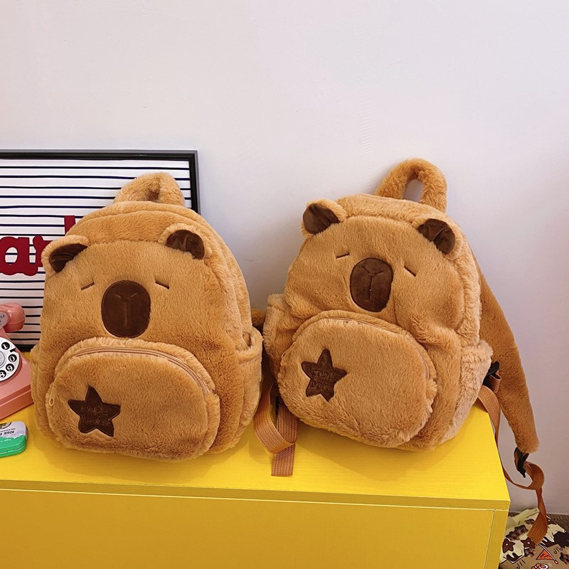 The new Capibara plush Capybara backpack 2024 is cute and versatile. It's a cute plush bag for girls and cartoon students full figure