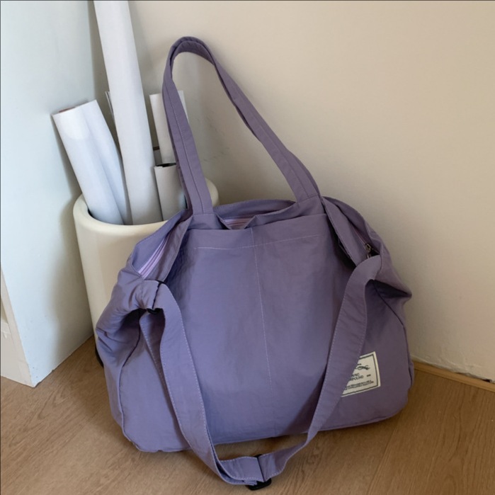 2025 New Japanese casual single-shoulder crossbody bag, women's large-capacity canvas bag, commuter tote bag, versatile underarm bag full figure