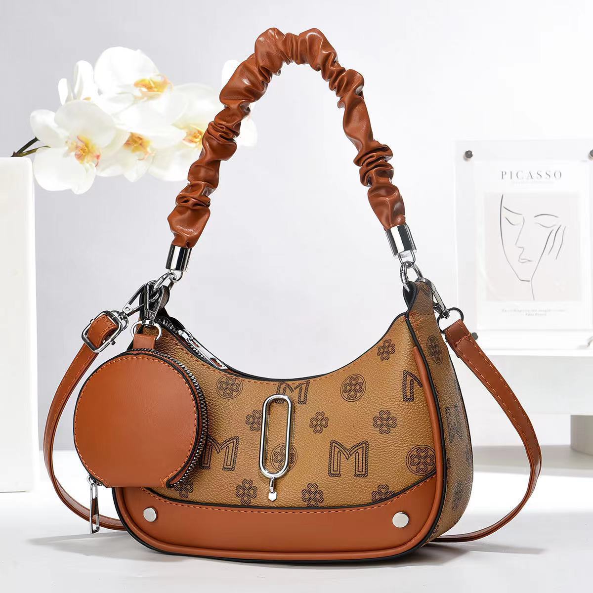 New large-capacity, fashionable and versatile underarm women's bag with printed text, single-shoulder hand-carry, stylish women's bag, crescent-shaped small bag Application Scenario