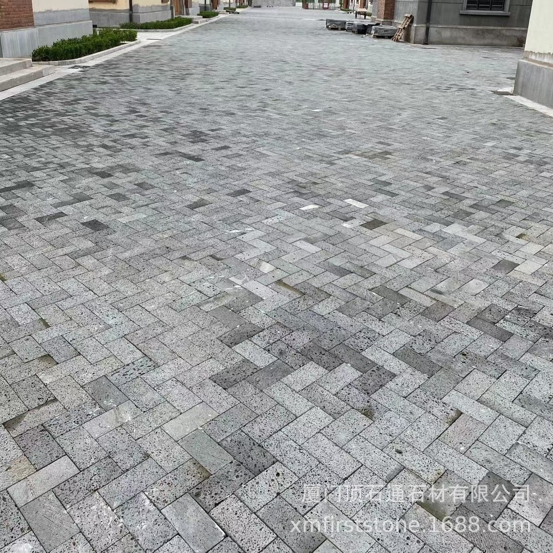 Natural black hole stone paving stones, Hainan black volcanic stone slabs for courtyard landscaping, basalt volcanic rock paving stones full figure