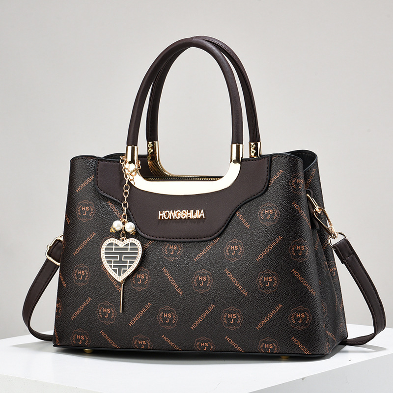 A new 2024 European and American fashion retro large-capacity handbag, a versatile and elegant women's printed single-shoulder handbag full figure