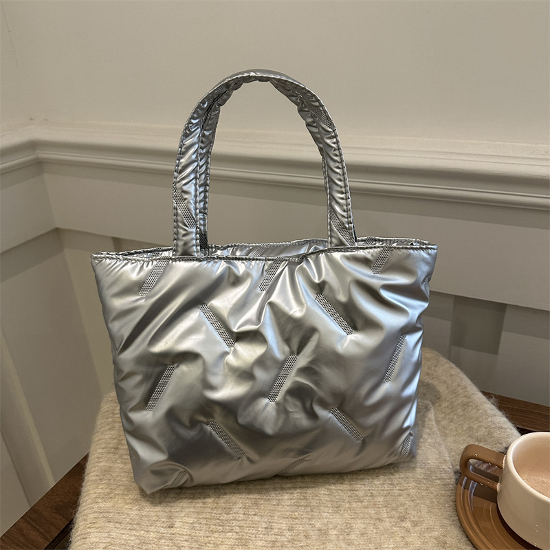 The new winter 2024 shiny space cotton jacket, single-shoulder hand-held women's bag, casual, stylish and large-capacity tote bag full figure