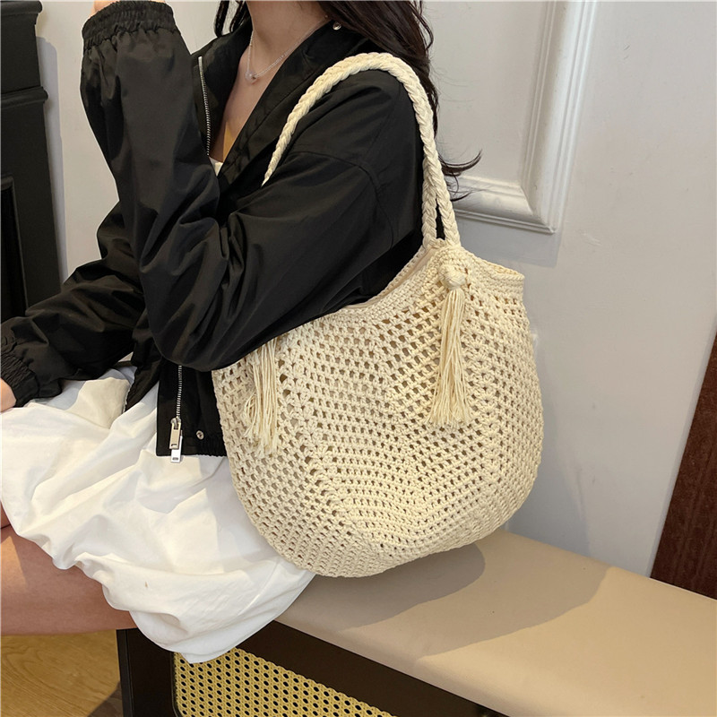 Versatile knitted hand-held underarm bag 2025 new style fashionable large-capacity bucket bag Seaside vacation beach single-shoulder bag details Picture