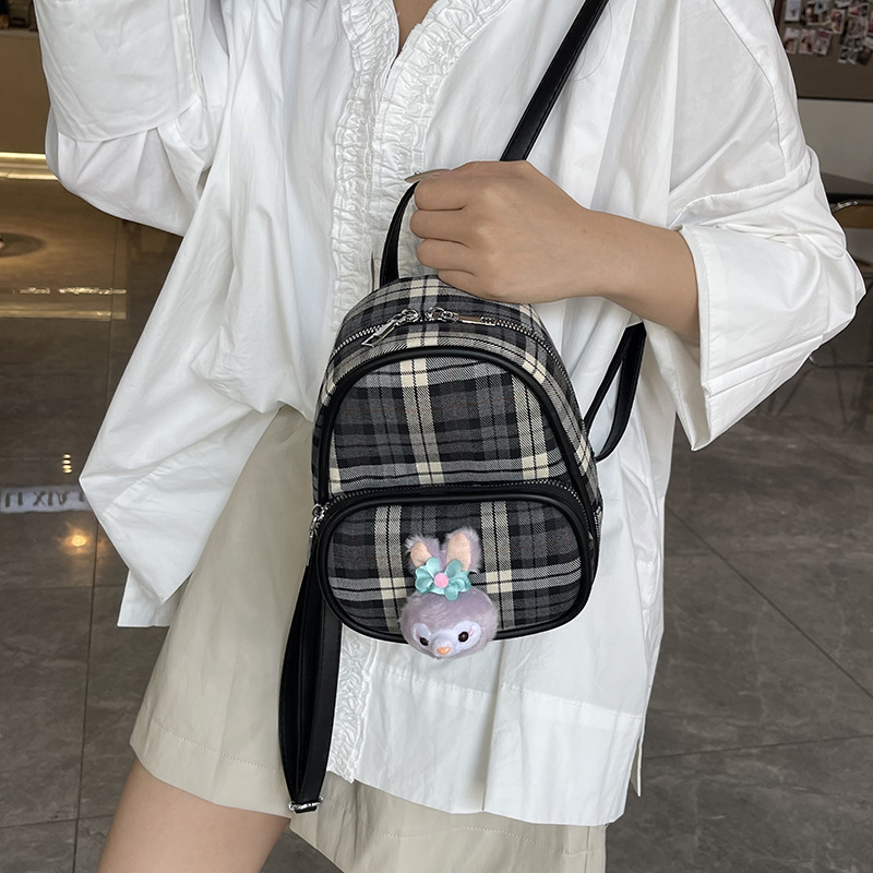 This is a cute checkered handbag for women, a new model of a niche canvas backpack in 2025, and a versatile Korean-style mini backpack Application Scenario
