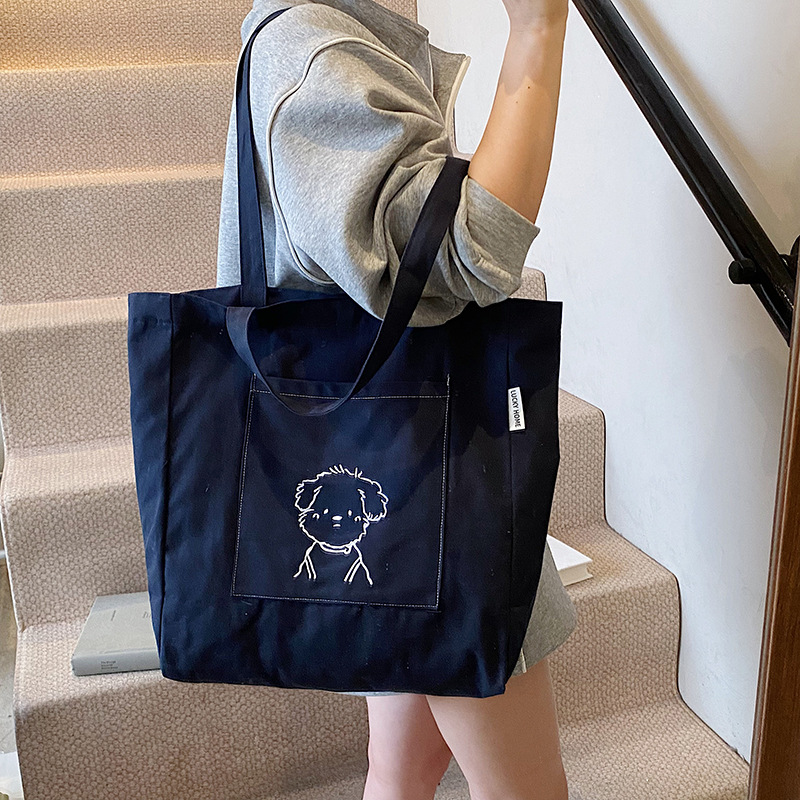 The 2025 new trendy and simple printed large-capacity single-shoulder bag is a versatile, casual, simple and niche commuter tote bag for women details Picture