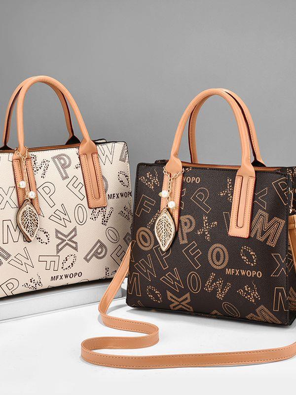 A versatile and fashionable women's handbag, a new 2023 stylish commuter tote bag, a niche and high-end single-shoulder bag details Picture