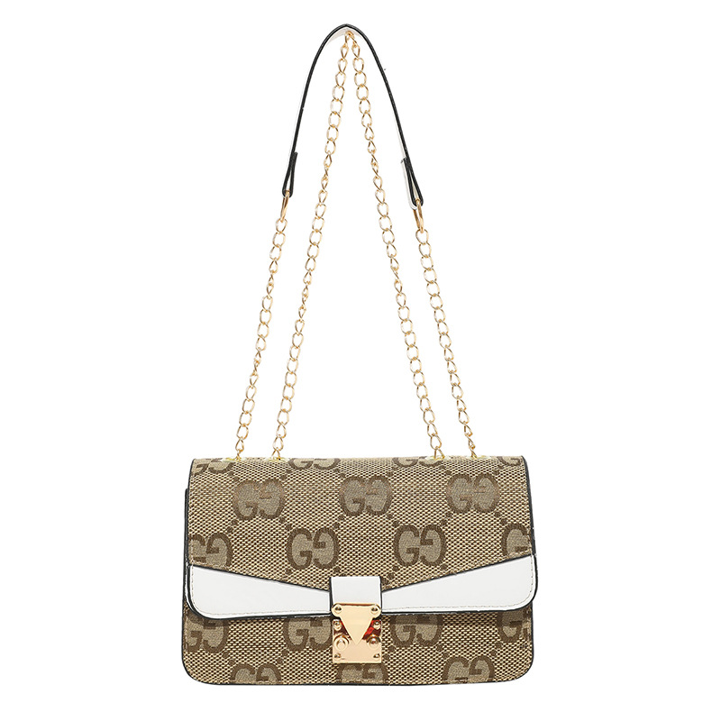 The new Korean version of the women's single-shoulder bag features a unique design, a textured underarm bag, and a fashionable hand-held small square bag with color contrast and patchwork Item Picture