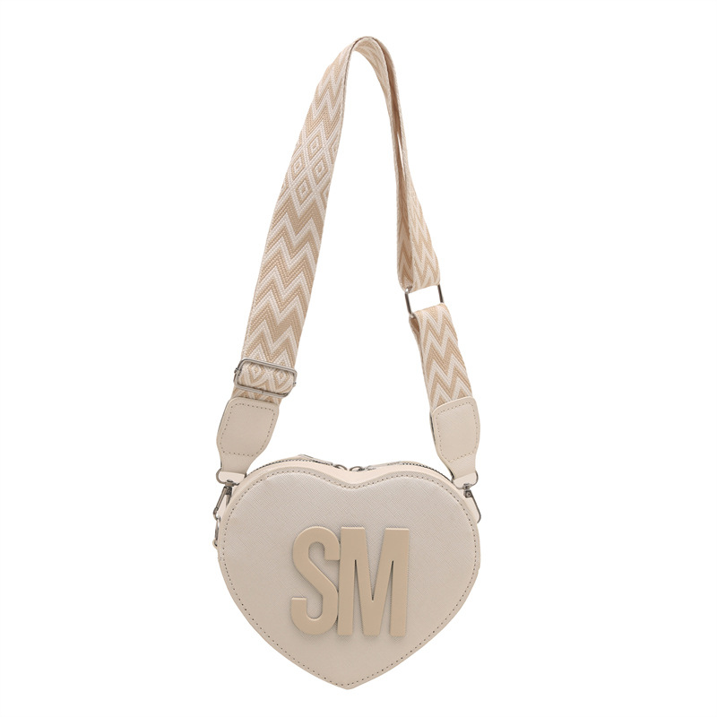 The new Spring/Summer 2025 fashion and stylish heart-shaped bag, simple and trendy single-shoulder bag, casual, sweet and individual crossbody bag for women Item Picture