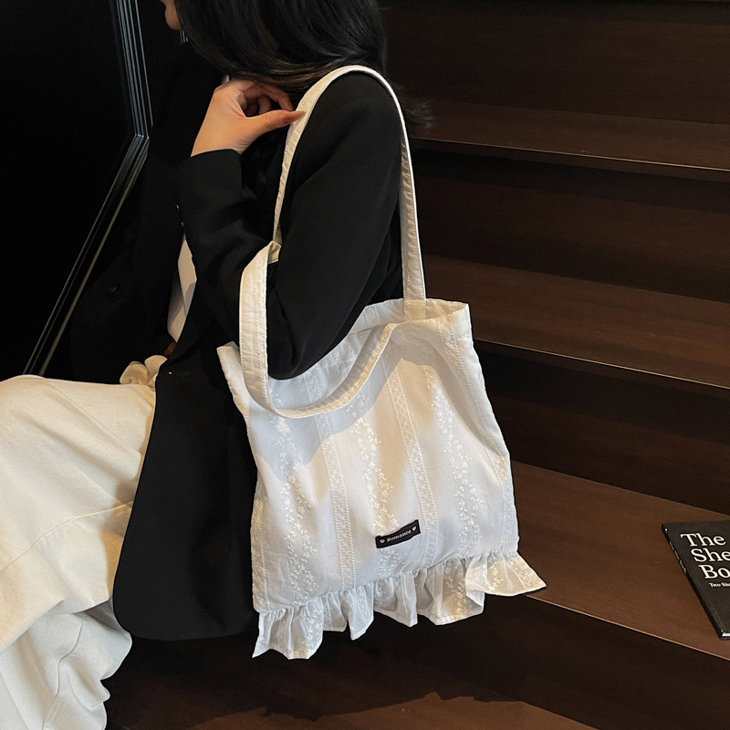 Korean style Instagram simple cloth bag with large capacity bucket bag for women, 2025 new fashionable work commute casual single-shoulder bag details Picture