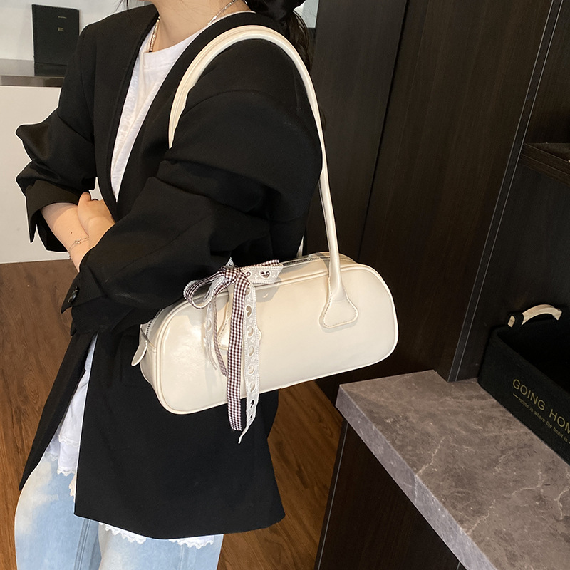 A niche bow handbag for women, a new trendy Korean-style textured underarm bag with a large capacity and pillow bag for the summer of 2025 details Picture