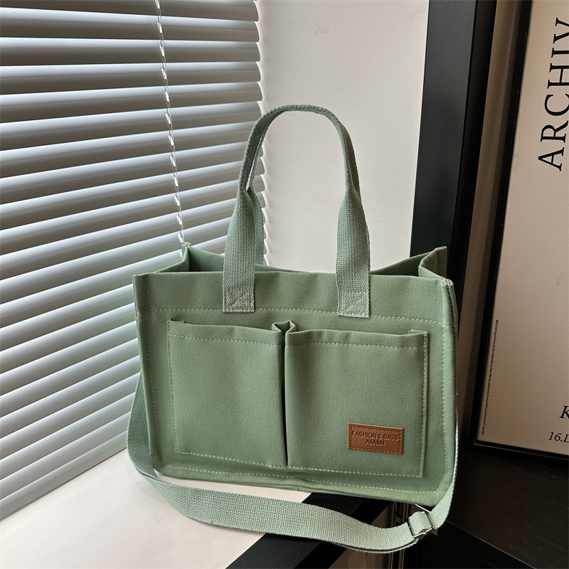Canvas bag, women's tote bag, large-capacity autumn crossbody bag, 2024 new versatile ins hand-held commuter bag full figure
