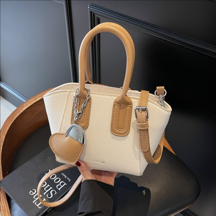 Lychee-patterned hand-held fashionable bucket bag for women, 2025 new retro single-shoulder bag, niche quality commuter crossbody bag for women full figure