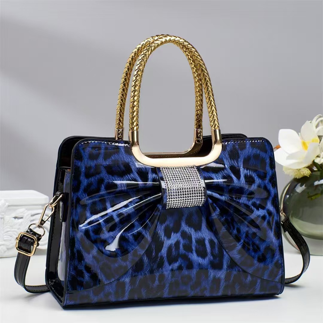 Cross-border trade patent leather shiny hand-held women's bag 2025 new style with hot diamonds, fashionable and versatile, elegant leopard print women's bag full figure