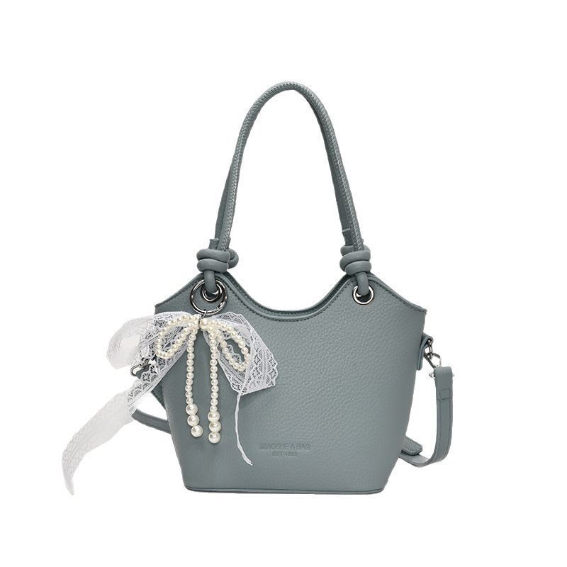 Fashionable solid color simple hand-held bucket bag for women, 2025 new Korean style Instagram single-shoulder bag, trendy and casual crossbody bag Item Picture