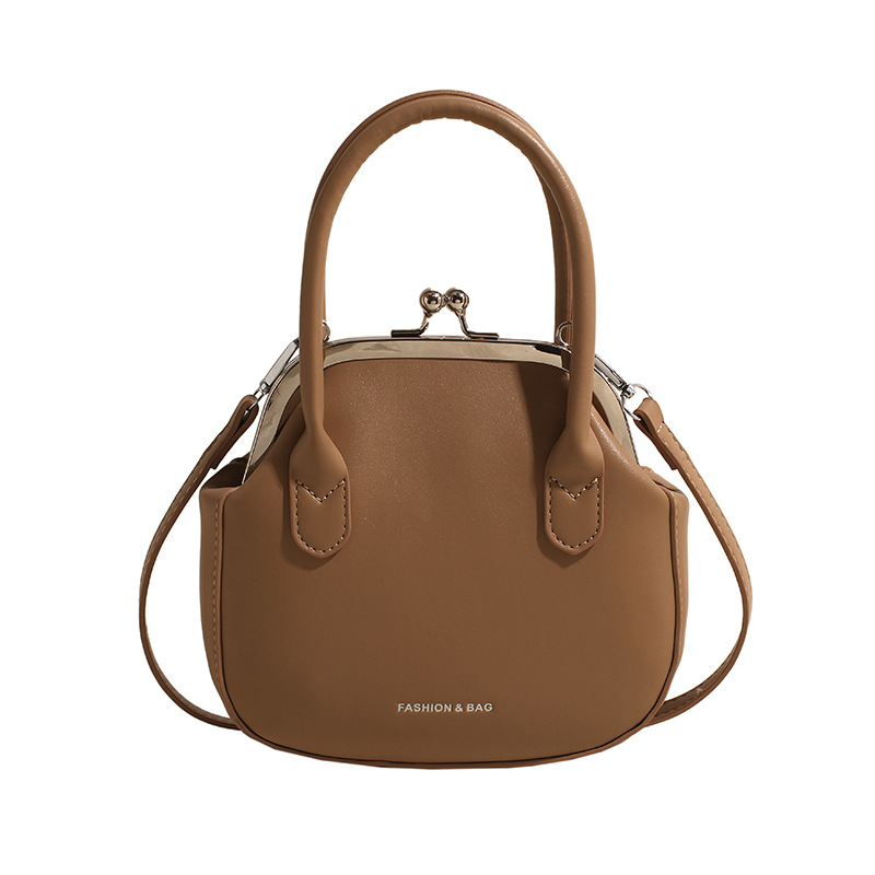 A new 2024 Korean-style niche design single-shoulder hand-carry bucket bag for women, a versatile and casual crossbody shell bag Item Picture