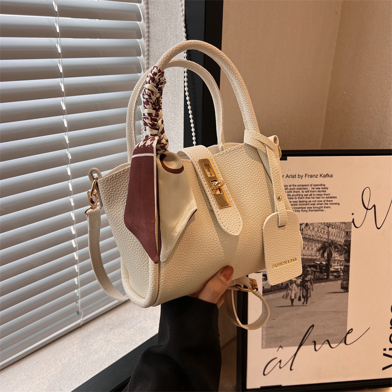Niche design handbag, 2024 new style, fashionable and retro wing bag, stylish silk scarf decoration, single-shoulder crossbody bag full figure