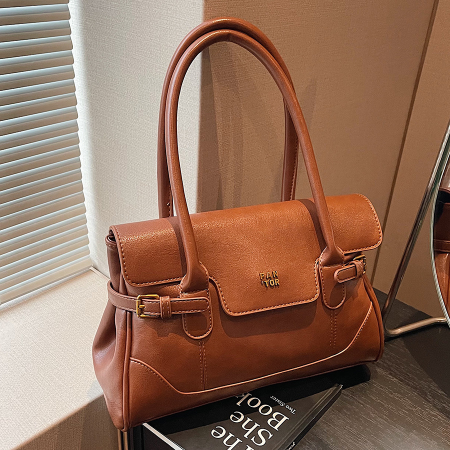A high-capacity tote handbag for women's 2024 new design, featuring a high-end, light luxury and niche underarm briefcase full figure