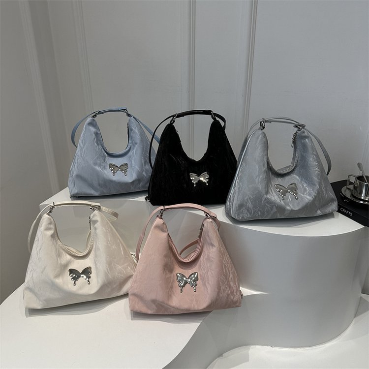 Large-capacity women's fashionable and versatile casual single-shoulder tote bag, 2024 new commuter butterfly backpack wholesale full figure