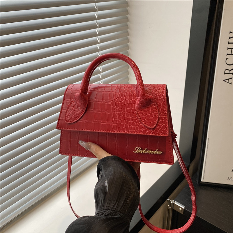 This year, the cross-border small square bag 2025 is a new style of fashionable and casual commuting crossbody bag from Europe and America, featuring a popular letter single-shoulder bag full figure