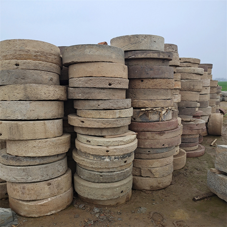 Engraved stone grinding discs, old rural items, old stones, treads, stone grinding discs, ancient-style beautiful countryside, engraved old grinding discs full figure