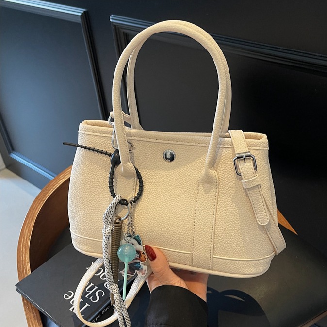 Cross-border retro versatile hand-held bucket bag, women's best-selling fashionable commuter tote bag, casual and high-quality single-shoulder crossbody bag full figure