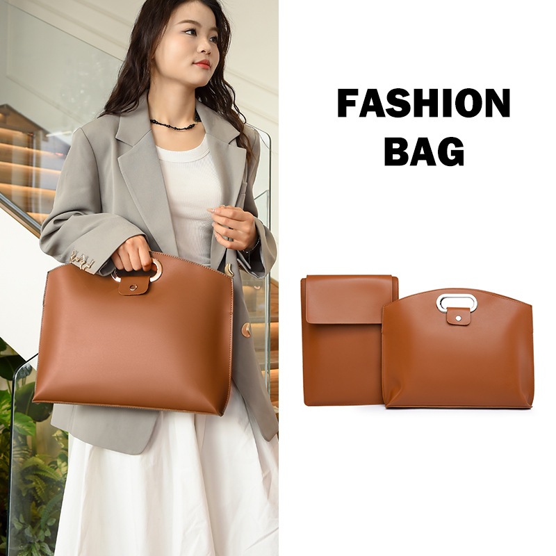 A simple yet sophisticated women's 2025 new stylish large-capacity clutch bag for work and commuting, a laptop bag full figure