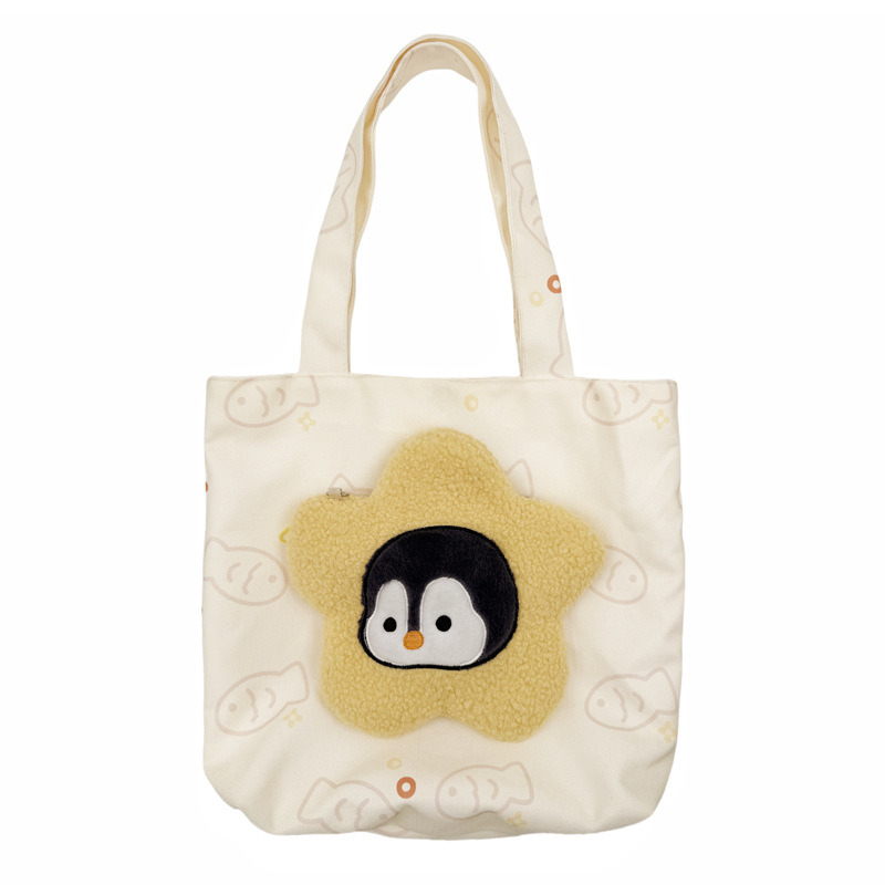 The new printed canvas bag combination is cute and versatile. It features a small penguin plush crossbody bag and a large-capacity tote bag for classes Item Picture