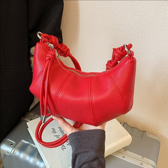 2025 New niche design trend dumpling bag for women, casual and fashionable single-shoulder bag, simple solid color, stylish crossbody bag full figure