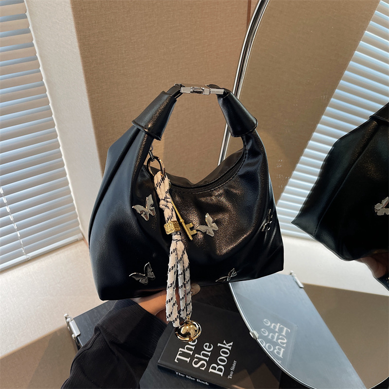 A high-end and niche design bag for women 2025, a new fashionable single-shoulder crossbody bag, simple and casual hand-held dumpling bag details Picture