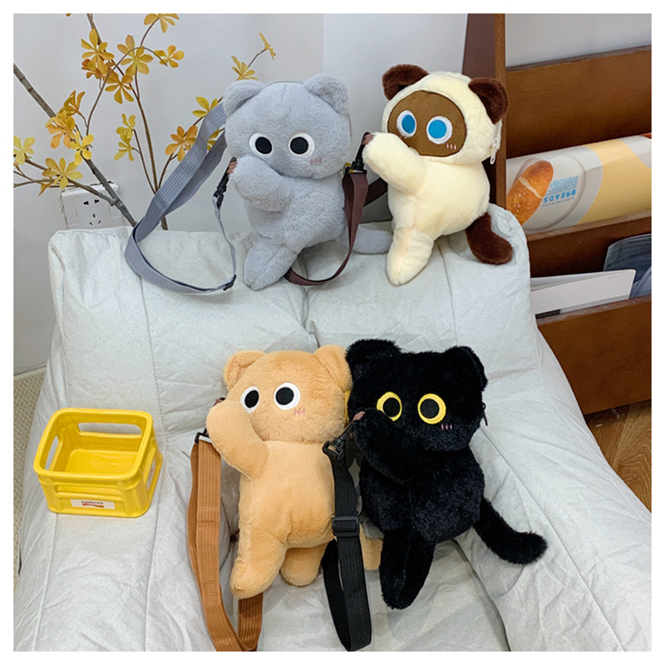 A large-capacity, girlish single-shoulder storage bag featuring a plush toy doll with a slant straddle in a cartoon style full figure