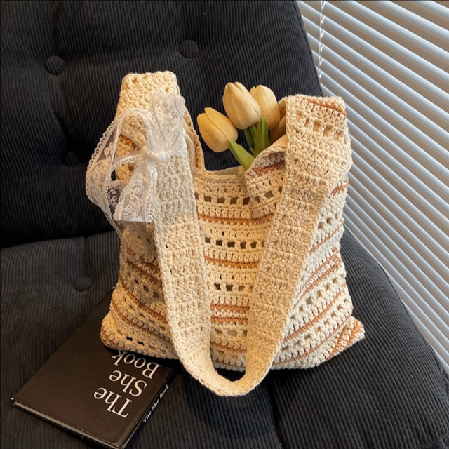 Casual large-capacity bucket bag for women 2025 summer, new knitted hollowed-out underarm bag, striped versatile commuter single-shoulder bag full figure